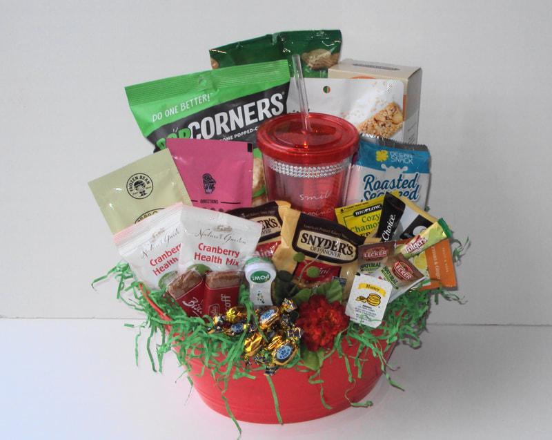 Custom snack basket filled to the brim with cookies, tasty chips, nuts, sample teas of  delightful flavors and add a gift product to boost the style of your basket.