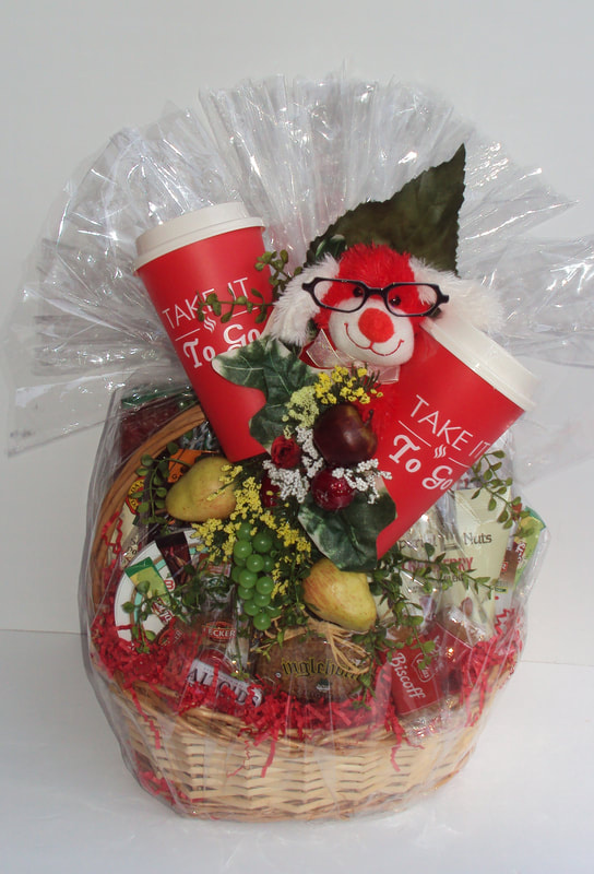 Custom snack design gift basket, deliver from Jax, fl. Beautifully design in a whimsical finish.  
