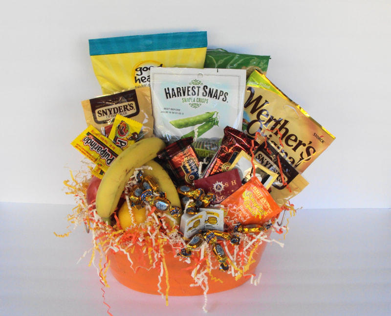 Budget friendly basket filled with fruit, snacks, chips, candies, teas and more. Best seller!!
