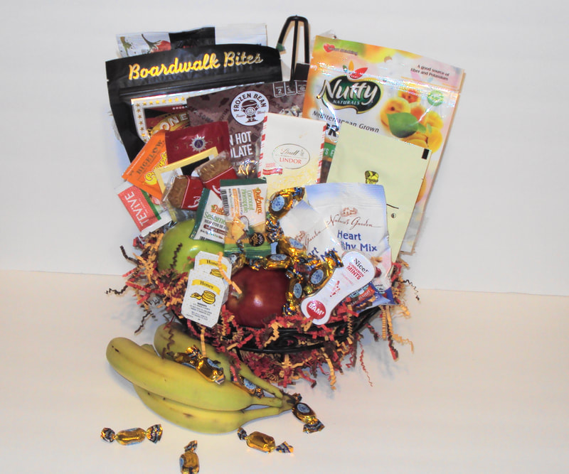 Fruit and snacks arranged in a banana wired basket 